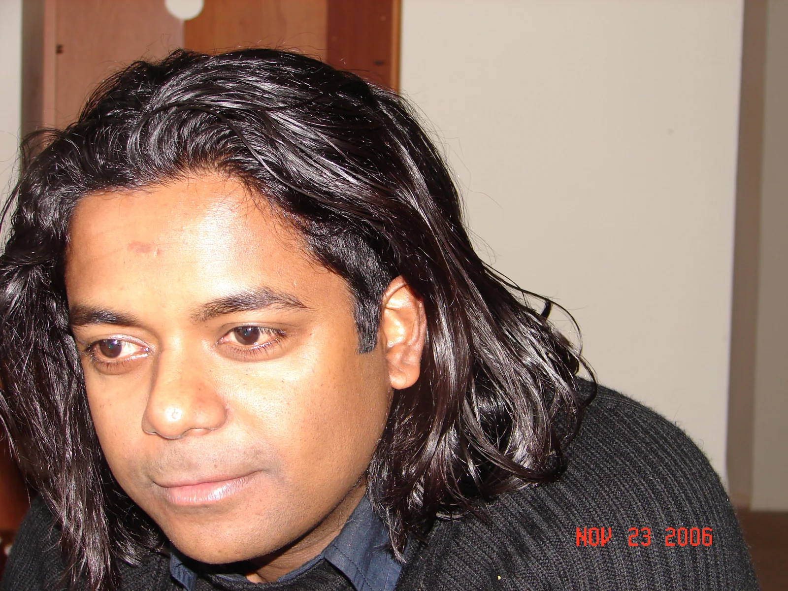 Close portrait of Dholi Baba with shoulder-length hair