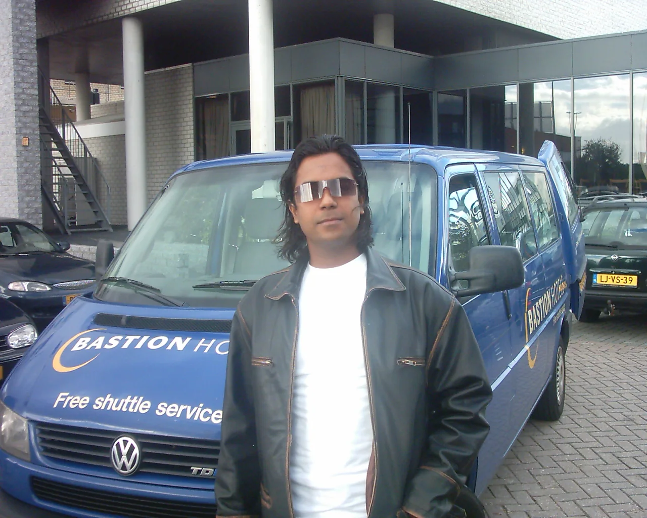Dholi Baba wearing a leather jacket and sunglasses during his travels